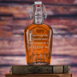 I Survived The Pandemic, One Ounce At A Time Engraved Flask Humorous Gift